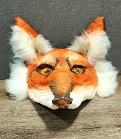 Customized Red Fox young adult /adult furry mask. Surprise a friend or treat yourself with our handmade Cosplay unique mask. Faux fur is very soft and comfortable for wearing and   has elastic for wearing and string for hanging. The mask has generous eye holes so you can wear it  for hours. Due to the difference of light and display, there may be a slight deference in color. This mask is  handcrafted and you may see some hot glue spots inside, or other imperfections.  I am doing my best  to make every mask to look perfect, but make sure you can accept these imperfections  before you order it. If you have any questions, please feel free to contact me. Please make sure you will be happy with what you order -Note: all masks are handmade and cannot be returned or exchanged. All masks  are hand Masquerade Party Mask, Unique Masks, Cosplay Mask, Fox Mask, Party Mask, Mask Costume, Masquerade Party, Costume Mask, Mask Party