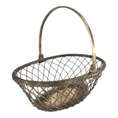 a metal basket with an old pair of shoes hanging from it's side, on a white background