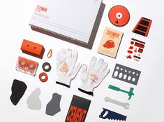 an assortment of items that include gloves, scissors and other things to make it look like they are part of a science project