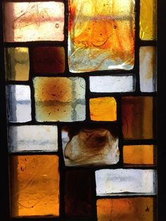 a stained glass window with a smiley face on it