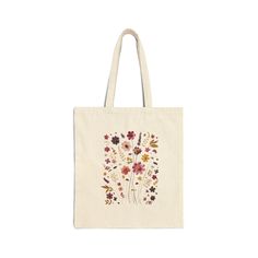 This 100% cotton bag comes in one size - 15" x 16"- perfect for everyday wear. While the canvas material will show off your designs in great colors, it's durable and will last for years. The bag features 20" handles (made from the same canvas), making it easy to carry even with a week's worth of shopping. .: 100% cotton canvas .: Heavy fabric (12 oz/yd² (406.9 g/m .: Sewn-in label .: Available in natural and black colors Canvas Tote Bag With Cotton Gusset, Cotton Tote Shoulder Bag, Casual Cotton Canvas Bag, Cotton Canvas Tote Bag With Cotton Gusset, Natural Cotton Canvas Travel Bag, Natural Cotton Canvas Bag For Travel, Cotton Canvas Bag With Gusset For Everyday Use, Cotton Canvas Tote Bag For Daily Use, Cotton Tote Canvas Bag For Daily Use