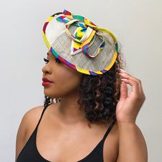 Get a distinctive and elegant look with these African Print fascinator hair clip. Made with Ankara fabric and fine raffia fibers, these handmade colorful African Fascinator will give you a Royal presence to any outfit.The fascinator in tied to the hair via an Alligator Hair Clips*** Also called Ascot Hat, Kentucky Derby Hat, Church Hat, Couture Hat. Origin: Handmade in Cameroon AFRILEGE: The African Privilege Fascinator Hair, Couture Hats, Ascot Hats, Church Hat, Kentucky Derby Hat, Derby Hat, Church Hats, Ankara Fabric, Derby Hats