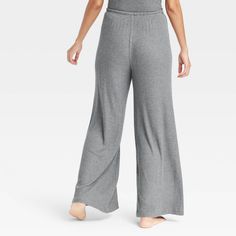 These Cozy Ribbed Wide-Leg Pants from Auden™ will keep you nice and comfy as you lounge about the house. Made from lightweight, super-cozy soft-brushed rib fabric with spandex, these mid-rise pants feature a full elastic waistband with a drawstring to help you find your perfect fit. Cut to an ankle length, they also feature wide, flared legs for a touch of chic style. Auden™: Comfort true to every shape & hue. Ribbed Wide Leg Pants, Shipt Shopper, Rib Fabric, Beach Pants, House Made, Bottom Clothes, Pull On Pants, Straight Pants, Ribbed Fabric