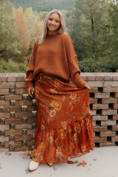 Get ready to fall in love with the Larina Midi Skirt! With its perfectly printed, billowy A-line silhouette, this skirt is an autumn essential you'll reach for again and again. Pair it with a basic tee and sneakers for a cozy coffee date or wrap up in a chunky knit for a trip to the pumpkin patch. *Chiffon - 100% Polyester*Smocked waist*Lined*58" waist to hem Midi Skirt Outfit Fall, Boho Fall Outfits, Skirt Outfit Fall, Midi Skirt Outfit, Cozy Coffee, Denim Short Dresses, Garden Harvest, Coffee Date, Coffee Cozy