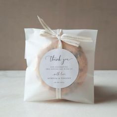 a bag filled with cookies sitting on top of a table