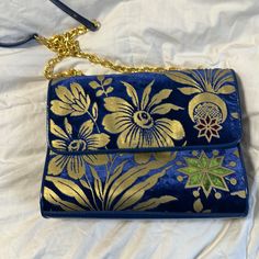 Questions? Leave A Comment Below! Blue Evening Shoulder Bag, Blue Square Bag With Gold-tone Hardware, Blue Shoulder Bag With Gold-tone Hardware For On-the-go, Blue Tote Bag With Gold-tone Hardware, Designer Blue Shoulder Bag With Gold-tone Hardware, Blue Crossbody Shoulder Bag With Gold-tone Hardware, Velvet Purse, Tory Burch Bags, Tory Burch Bag