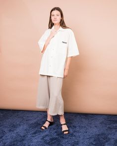 [lowkey trendsetter vibes]Vintage oversized cream starched MAZDA button up•Short sleeves•Button-up•Oversized fit•Starched and perfectly stiffLABEL: New Polo by Publi MunuoCONDITION: Vintage / ExcellentSIZE: oversized S/MModel is 5'10'' and a size S. Please make sure to double check your measurements with the ones listed in the tab below. Beige Relaxed Fit Camp Shirt With Pockets, Summer Cream Camp Shirt With Relaxed Fit, Oversized Short Sleeve Button-up Shirt With Pockets, Oversized Button-up Short Sleeve Shirt With Pockets, Oversized Beige Shirt For Summer, Oversized Beige Summer Shirt, Beige Short Sleeve Camp Shirt For Spring, Casual Beige Button-up Short Sleeve Shirt, Short Sleeve Shirt With Buttons For Loungewear