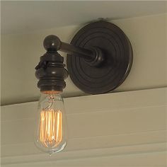 Edison Socket Sconce with restoration style and hardware holds a single bulb. Den Makeover, Basement Furniture, Sconces Living Room, Wall Light Shades, Primitive Homes, Vintage Edison Bulbs, Shades Of Light, Industrial Kitchen