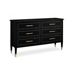 a black dresser with gold handles and drawers