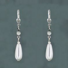 Sadie Green's Pearl Drop Earring White Nickel-free Dangle Clip-on Earrings, Nickel-free White Dangle Clip-on Earrings, Classic White Pearl Drop Clip-on Earrings, Nickel-free White Dangle Teardrop Earrings, White Nickel-free Dangle Teardrop Earrings, White Dangle Teardrop Earrings, White Hypoallergenic Dangle Clip-on Earrings, Classic White Dangle Clip-on Earrings, White Hypoallergenic Drop Clip-on Earrings