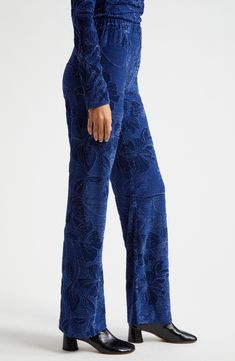 Twinkled in tonal blooms and rendered in a brilliant shade of blue, these elastic-waist pants are ready for both fun and fancy looks. 32 " inseam; 20" leg opening; 11" front rise; 14 1/2" back rise (size Medium) Elastic waist 51% recycled polyester, 38% metalllic fibers, 11% polyester Hand wash, dry flat Imported Fancy Looks, Jacquard Pants, Stine Goya, Shade Of Blue, Floral Jacquard, Elastic Waist Pants, Fine Line, Waist Pants, Shades Of Blue