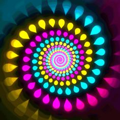 an image of a colorful circular object that looks like it has been made out of colored circles