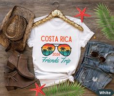 Looking for a cute, matching set of family trip vacation shirts for a Costa Rica Holiday in 2024 for the all ages?   If you are looking for a unique way to commemorate your upcoming friends or family vacation? Look no further than our custom family vacation shirt! Whether you're planning a cruise, a beach trip, or a Christmas  vacation, our shirts are perfect for capturing all the memories together. Plus, our designs are totally customizable with your family name and location of your trip - so y Fun Tops For Family Vacation In Summer, Fun Summer Top For Family Vacation, Fun Summer Tops For Family Vacation, Casual T-shirt For Family Vacation In Summer, Casual Summer T-shirt For Family Vacation, Casual Summer Shirt For Family Vacation, Family Matching T-shirt For Beach Season Vacation, Family Matching T-shirt For Beach Vacation, Casual Tops For Beach Season Family Vacation