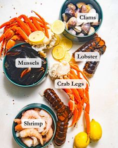 various types of seafood are shown in bowls