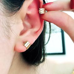 Chic, wide huggie hoop earrings made in 14K yellow gold. It comes in a choice of smooth or diamond-cut finish. It's suitable to stack on cartilage, helix, or earlobe. * Metal: 14kK Solid Yellow Gold * Stamp: 14K * Inner Hoop size: approx 5 mm * Earring Width: approx 6 mm * Sold as Single or A Pair ❤️Visit our official website for exclusive new products.      https://elekalonjewelry.com/ ❤️Follow us on Instagram @ elekalonjewelry for the latest projects and much more! ❤️If you have any questions, Gold Huggie Wrap Earrings For Pierced Ears, Gold Huggie Wrap Earrings, Modern Huggie Ear Cuff, Gold Huggie Ear Cuff With Matching Earrings, Minimalist Gold Huggie Ear Climbers, Gold Hypoallergenic Huggie Wrap Earrings, Hypoallergenic Gold Huggie Wrap Earrings, Gold Small Hoop Hypoallergenic Ear Cuff, Gold Hypoallergenic Small Hoop Ear Cuff