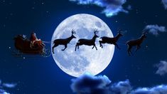 santa's sleigh with reindeers flying in front of the moon