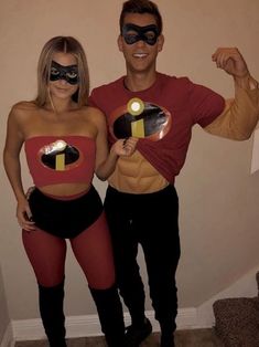 a man and woman dressed up in costumes