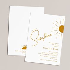 two white and gold wedding cards with the word sunshine printed on each card, along with an envelope