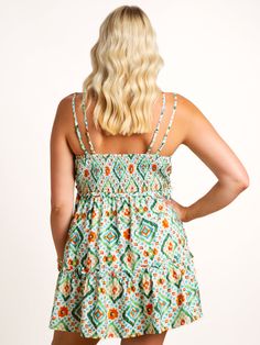 Add some flair to your wardrobe with our Golden Horizon Printed Mini Dress! Featuring a vibrant green multi print, adjustable straps, and a v-neckline, this mini dress will have you turning heads. Plus, the smocked back ensures a comfortable and flattering fit. Perfect for any occasion! Danielle is 5'8" and wearing a Medium. Green Vacation Sundress With Spaghetti Straps, Green Sundress With Spaghetti Straps For Vacation, Green Spaghetti Strap Sundress For Vacation, Green Mini Dress With Straps, Green Vacation Dress With Tie Straps, Green Sleeveless Mini Dress With Tie Straps, Green Dresses With Adjustable Straps For Vacation, Sleeveless Green Mini Dress With Tie Straps, Green Strappy Beach Dress