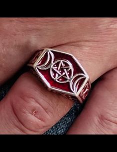 high quality Sterling silver ring high polished marked 925 design: Sterling silver Wicca ring Triple Moon Pentagram Occult Celtic Pagan symbol with Red enamel dimension of the top: 15 mm along the finger x 19 mm wide (15mmx19mm) average weight: 23 grams depending on the size Red Symbolic Sterling Silver Ring, Triple Moon Pentagram, Moon Pentagram, Celtic Pagan, Pagan Symbols, Occult Symbols, Triple Moon, Average Weight, Ancient Symbols