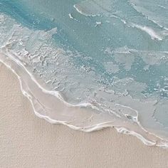 an abstract painting of waves on the beach