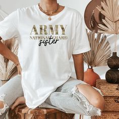 Beautiful Army National Guard Shirt is the perfect gift.  This classic unisex jersey short sleeve tee fits like a well-loved favorite. Soft cotton and quality print make users fall in love with it over and over again. These t-shirts have-ribbed knit collars to bolster shaping. The shoulders have taping for better fit over time. Dual side seams hold the garment's shape for longer.  Please feel free email me if you don't see a size or color that you want.  ** Rolled sleeves in pictures is for styling purposes only CARE INSTRUCTIONS: Wash cold, tumble dry low. Wash with like colors SIZING: >> Runs true to size , order a bigger size for a more relax style  **PLEASE NOTE: Colors may seem different on the computer screen, or in the lighting in which the picture was taken ** **I DO NOT ACCEPT EXC Camouflage Cotton T-shirt With Sublimation Print, Relaxed Fit Camouflage Cotton T-shirt, Camouflage Cotton T-shirt With Letter Print, Camouflage Sublimation Print Crew Neck T-shirt, Camouflage Crew Neck T-shirt With Sublimation Print, Camouflage Short Sleeve T-shirt With Relaxed Fit, Camouflage Relaxed Fit Short Sleeve T-shirt, Camouflage Short Sleeve Top With Letter Print, Camouflage Short Sleeve Tops With Sublimation Print