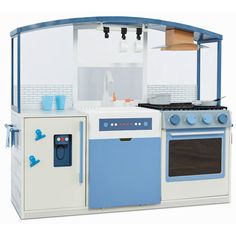 a toy kitchen with blue and white appliances