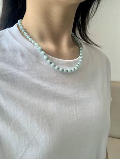 Introducing our Amazonite Stone Beaded Necklace, part of our Missy Jewelry Natural Stone collection. With its elegant and adjustable design, this turquoise necklace is perfect for both casual and formal occasions. Made with natural Amazonite stones and silver-plated copper alloy, it weighs approximately 25.13 g and features a 6 mm stone size. Enjoy the soothing and calming benefits of Amazonite while looking stylish. Details Material: Natural Amazonite stones, silver-plated copper alloy Color: Turquoise with silver detailing Length: Approximately 48.5 cm (including 5 cm extension chain) Weight: Approximately 25.13 g Stone Size: Approx. 6 mm Style: Elegant, adjustable necklace for casual and formal occasions Missy Jewelry Natural Stone Necklace Collection Amazonite Necklace With Polished Beads As Gift, Elegant Light Blue Beaded Necklace, Light Blue Single Strand Necklace With Round Beads, Adjustable Light Blue Necklaces With Natural Stones, Single Strand Amazonite Beaded Necklaces As Gift, Turquoise Amazonite Beaded Necklace, Gift Amazonite Single Strand Beaded Necklace, Elegant Amazonite Bead Necklaces, Elegant Amazonite Beaded Necklace