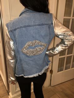 Silver sequined lips with sequined sleeves, jean jacket size M Trendy Spring Outerwear With Contrast Sequin, Casual Long Sleeve Denim Jacket With Sequins, Spring Party Casual Denim Jacket, Denim Sequined Long Sleeve Outerwear, Denim Party Outerwear, Long Sleeve Denim Outerwear With Sequins, Denim Long Sleeve Outerwear With Sequins, Winter Party Denim Jacket With Long Sleeves, Winter Party Denim Jacket Long Sleeve