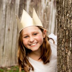 These metallic gold crowns are great for any royal themed event, birthday party, or anyone trying to finish a king, queen, prince, or princess costume.  Each crown is made from metallic twill with embroidered edges.  Crowns have adjustable hook/loop fastening in the back to fit a range of sizes (one size fits most).   OPTIONAL PLUSH SHERPA TRIM - You can choose to have this crown with or without a soft sherpa trim along the bottom. Custom Designs are available upon request. Any Customization/Personalization may require additional fees. Gold Crown Costume Hat, Gold Tall Crown Costume Hats And Headpieces, Gold Costume Hat With Tall Crown, Gold Costume Hats With Round Crown, Gold Tall Crown Costume Hat, Gold Costume Crown With Structured Shape, Gold Tall Crown For Costume Party, Gold Structured Crown For Costume, Gold Costume Crown