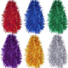 six different colored tinsel christmas trees