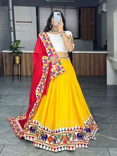 Celebrate Navratri in style with our exquisite Navratri Garba Lehenga Choli Set. This stunning traditional Indian outfit is designed to add a burst of color and elegance to your Navratri festivities. Featuring printed lehenga choli in heavy Butter silk. It has 4 mtr flair Skirt and blouse both are stitched.  Lehenga length is 40 to 42  inches. blouse is 34 to 42 inches Anarkali Lehenga With Mirror Work For Traditional Ceremonies, Multicolor Anarkali Set For Traditional Ceremonies During Eid, Choli With Pallu For Festivals In Traditional Drape, Art Silk Choli For Navratri, Festival Choli With Pallu And Traditional Drape, Navratri Cutdana Choli With Traditional Drape, Chanderi Lehenga For Traditional Ceremonies And Navratri, Bollywood Style Choli With Cutdana For Festivals, Bollywood Style Choli With Pallu For Traditional Ceremonies