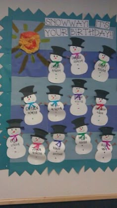 a bulletin board with snowmen on it