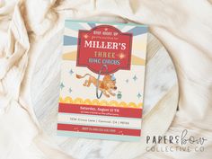 a children's book called miller's three little circus on a white blanket