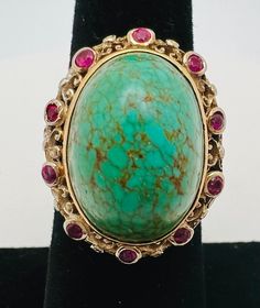 Antique 14K Yellow Gold Turquoise Ruby Cocktail Ring Size 6 A perfect gift for your loved one for any special occasion or holiday!  Total Ring Weight: 9.24g Ring Length: 31.76mm Ring Width: 19.08mm Ring Size: 6 Item will be placed in a gift box. * Heirloom Yellow Gold Turquoise Ring For Formal Occasions, Formal Turquoise Rings With Gemstone Accents, Fine Jewelry Hallmarked Yellow Gold Turquoise Ring, Fine Jewelry Hallmarked Turquoise Ring In Yellow Gold, Antique Yellow Gold Turquoise Ring For Anniversary, Antique Turquoise Gemstone Ring For Formal Occasions, Luxury Turquoise Ring With Gemstone Accents For Anniversary, Fine Jewelry Turquoise Ring In Yellow Gold, Gold Turquoise Ring For Formal Occasions