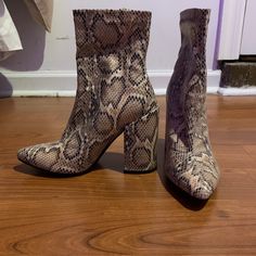 Brand New, Never Worn. Pointed Snakeskin Bootie, 4 Inch Heel. Fall High Heel Synthetic Booties, Fall Synthetic High Heel Booties, Snake Print Boots For Fall Party, Fall Party Boots With Snake Print, Snake Print Party Boots For Fall, Synthetic Pointed Toe Booties For Fall, Fall Synthetic Pointed Toe Booties, Party Ankle Boots With Snake Print, Party Snake Print Ankle Boots