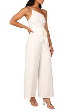 Elevate your special-occasion style with this asymmetric jumpsuit featuring a tie belt and a flowy, wide-leg silhouette. Hidden back-zip closure Asymmetric neck Adjustable strap Removable tie belt Partially lined 95% polyester, 5% spandex Hand wash, dry flat Imported White Sleeveless Jumpsuit With Adjustable Straps, Spring White Off-shoulder Jumpsuit, White Cotton V-neck Jumpsuit, White Stretch V-neck Jumpsuits And Rompers, White Wide-leg Jumpsuit With Pockets, Asymmetric Jumpsuit, Tie Belt, Wide Leg, Special Occasion