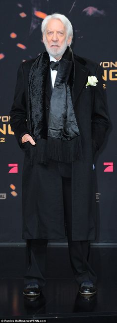 an older man in a tuxedo poses for a photo at the london film awards