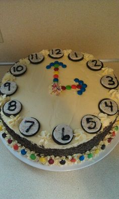 a white cake with black numbers on it