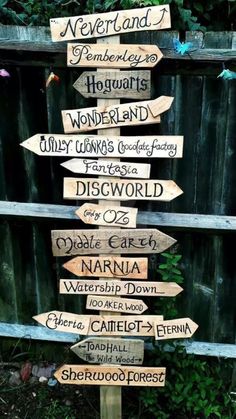 a wooden sign with many different directions on it