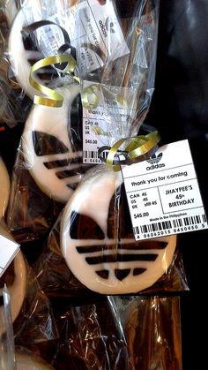 some cookies are wrapped in plastic and have tags on them