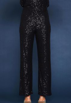 Elevate your wardrobe with our Black Sequin Pants. The classic chic design combined with just the right amount of bling will add a touch of luxury to any outfit. Take your style to the next level and stand out from the crowd. Crafted with meticulous detail, these pants are sure to make a statement. Available in XSmall, Small, Medium, Large and XLarge Runs true with stretchy lining Black Sequin Pants, Sequin Pants, Holiday Ready, Pants Large, Classic Chic, Sequin Fabric, Velvet Tops, Black Sequins, Chic Design