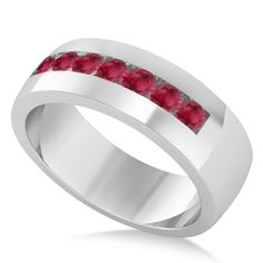 a white gold ring with red stones