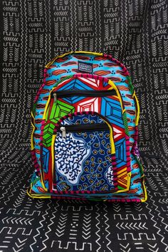 Patchwork Bag, African Print Backpack, Recycled BackpackSuper colourful quality African print backpack made from recycled ankara fabrics. Its the perfect size for a laptop and books with two front zipped compartments for all your little things. - Colour Me Crazy patchwork fabric- Material made from recycled fabric pieces.- Lined for extra strength with recycled flour sacks from the Takoradi flour Mill in Ghana!- Two front pockets and main compartment- Adjustable straps- Perfect to avoid plastic Everyday Use Standard Backpack With Patchwork, Everyday Patchwork Standard Backpack, Standard Patchwork Backpack For Everyday Use, Eco-friendly Multicolor Travel Backpack, Eco-friendly Multicolor School Backpack, Eco-friendly Multicolor Backpack, Eco-friendly Multicolor Rectangular Backpack, Eco-friendly Rectangular Multicolor Backpack, Patchwork Backpack