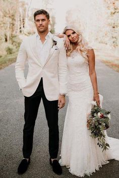 a bride and groom posing for a photo