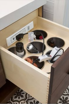 Docking Drawer steel canisters inside of a bathroom vanity drawer holding electrical items. Vanity Styling, Docking Drawer, Luxury Closets Design, Wardrobe Interior Design, Dressing Room Design, Closet Designs