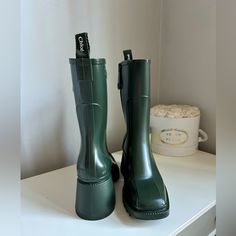 Rare Find Chloe Betty Pvc Rain Boots Size: Eu 36 Color: Forest Green Condition: New Comes With: Boots, Original Dust Bags (I Have The Original Box But It Would Be Big To Ship With Boots) Authenticity: Please Refer To Uploaded Order Receipt Trendy Green Boots For Outdoor, Green Rain Boots For Outdoor, Trendy Green Square Toe Boots, Chic Green Boots With Round Toe, Chic Green Closed Toe Boots, Rainboot Outfits, Rainboots Outfit, Grunge Skirt, Forest Green Color