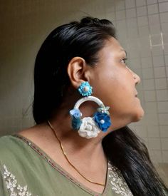 "Bohemian handmade floral Indigo blue and white hoop earrings. These floral hoops are made of crociate and fabric flowers in combination to pompoms,raffia, beads etc. These oversized statement cool hoop earrings are light in weight and ideal for the summer season. Earrings measure about approx. 3\" long and 2.65\" wide. PS: Carnation jewelry is handmade & handcrafted in India hence there is a possibility of a slight or small imperfection due to the fact that these are made by hand. I still make Carnation Jewelry, Blue And White Crochet, Crochet Flower Earrings, Black Heart Earrings, Boho Wedding Earrings, White Hoop Earrings, Bohemian Handmade, Floral Hoops, Blue And White Floral