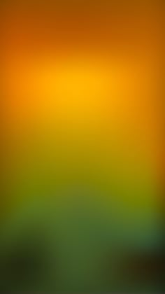 an orange and green blurry background