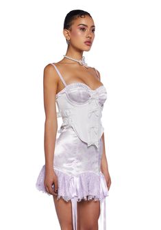 cuz make a statement on the dance floor. This underbust corset top has a linen construction with a satin lining, structured boning, an underwire bust, a satin ribbon lace-up design on the back, adjustable buckle closures on the sides, decorative bows on the front, a curved hem, and a side zipper closure. Underbust Corset Belt With Built-in Bra For Party, Feminine Underbust Corset With Built-in Bra, Feminine Wedding Corset With Built-in Bra, White Underbust Corset With Built-in Bra, Satin Underbust Corset Dress With Corset Back, Elegant Underwire Corset With Lace Trim, Lace Underwire Coquette Corset, Lace Coquette Underwire Corset, Coquette Lace Corset With Underwire